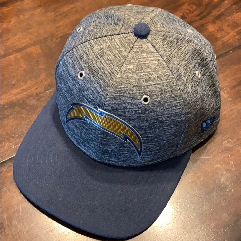 Chargers snap back hat. In great condition.